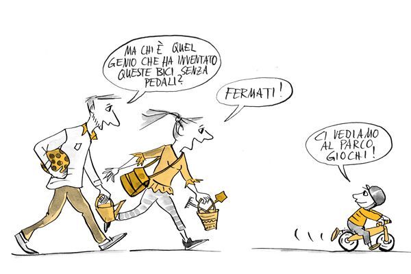 Il bambino si allontana in bicicletta 