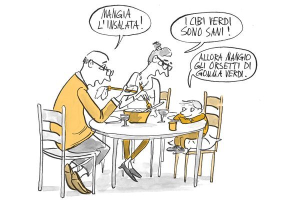 La famiglia mangia insieme a tavola 